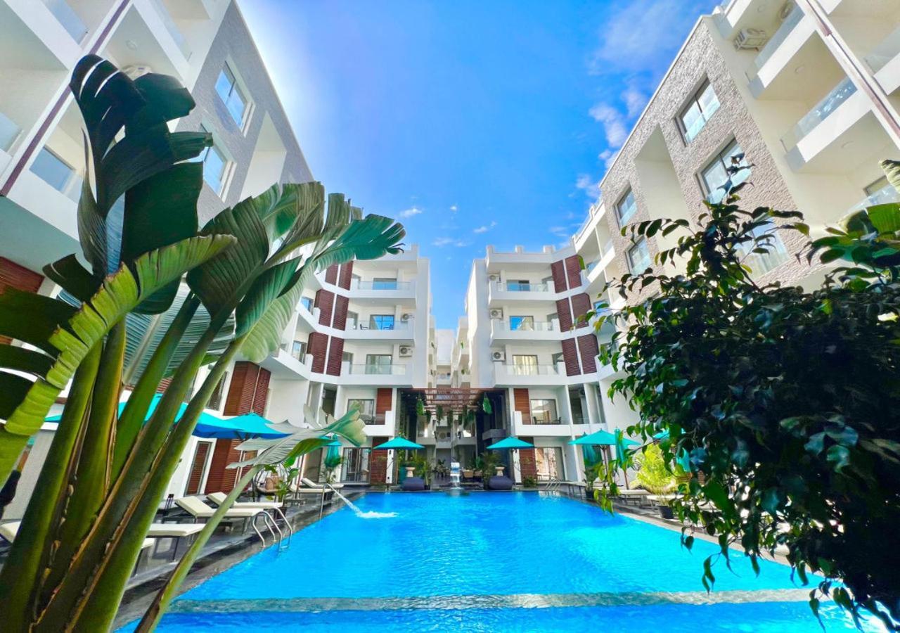 Sanctuary Sunlit Hurghada Haven With 4 Pools, Rooftop Sunsets & Gourmet Bites Steps Away Kültér fotó