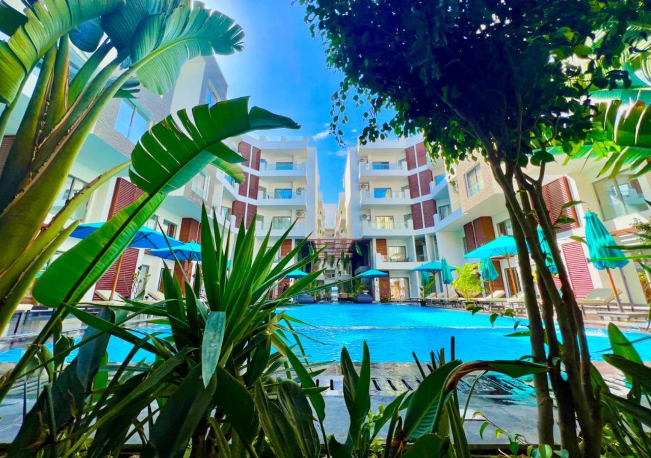 Sanctuary Sunlit Hurghada Haven With 4 Pools, Rooftop Sunsets & Gourmet Bites Steps Away Kültér fotó